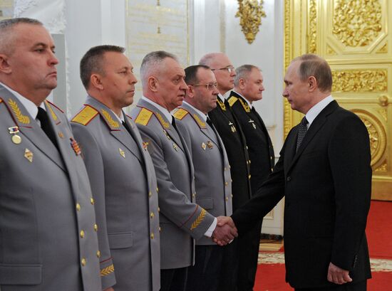 President Vladimir Putin attends intoroduction ceremony for officers appointed to top command posts