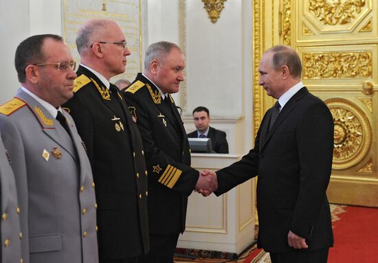 President Vladimir Putin attends intoroduction ceremony for officers appointed to top command posts