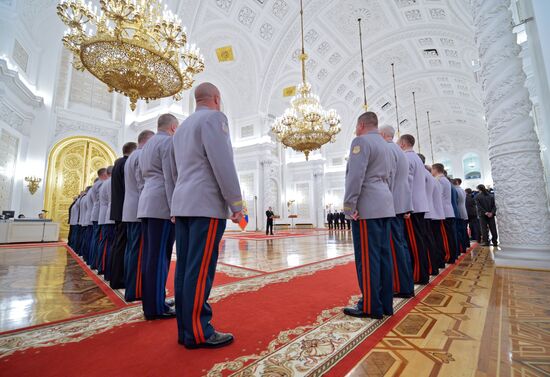 President Vladimir Putin attends intoroduction ceremony for officers appointed to top command posts