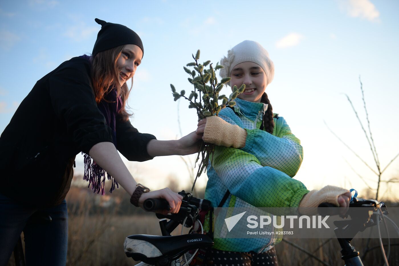 People collect willow branches for Palm Sunday on Lake Shartash in Yekaterinburg