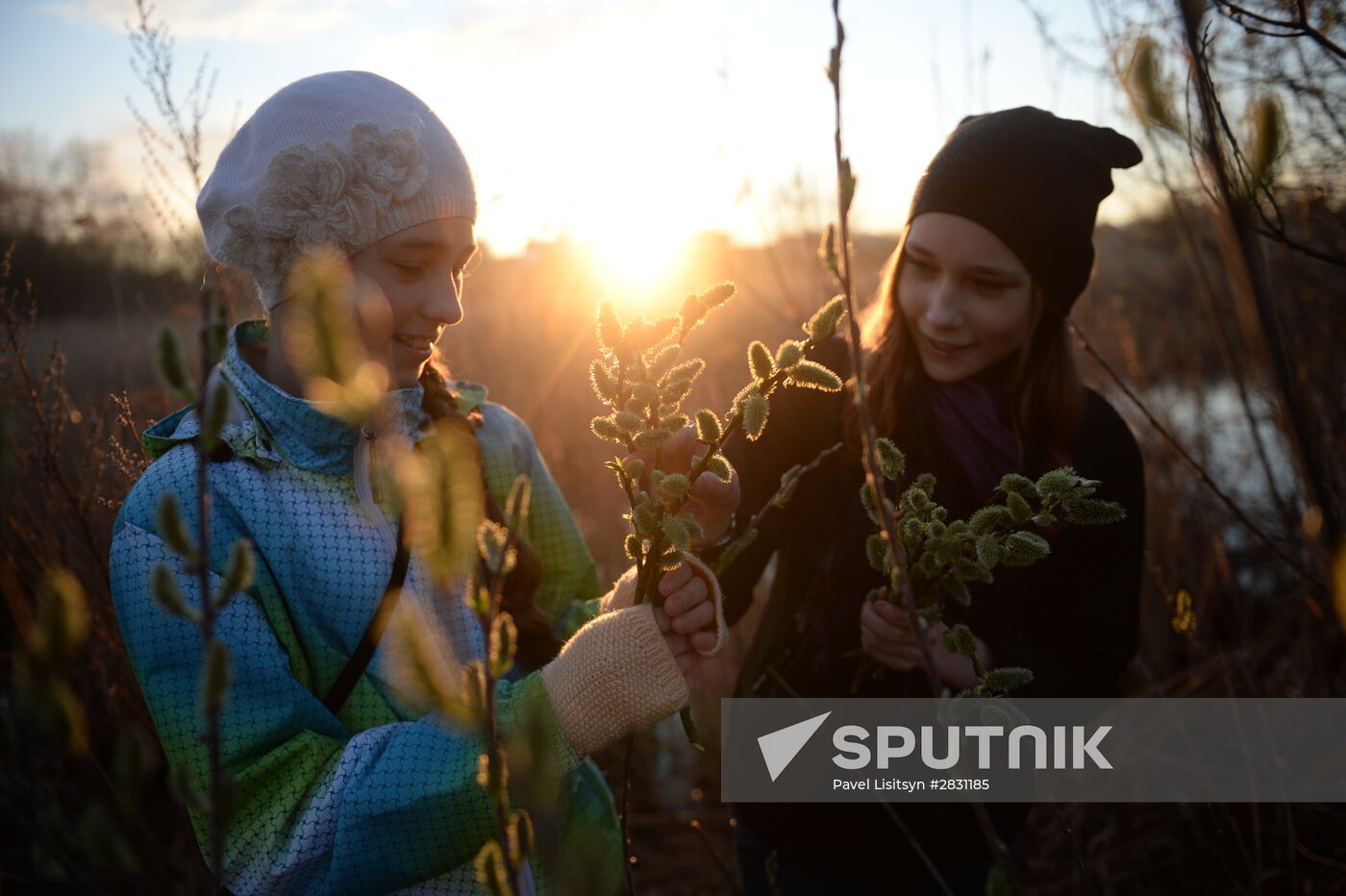 People collect willow branches for Palm Sunday on Lake Shartash in Yekaterinburg