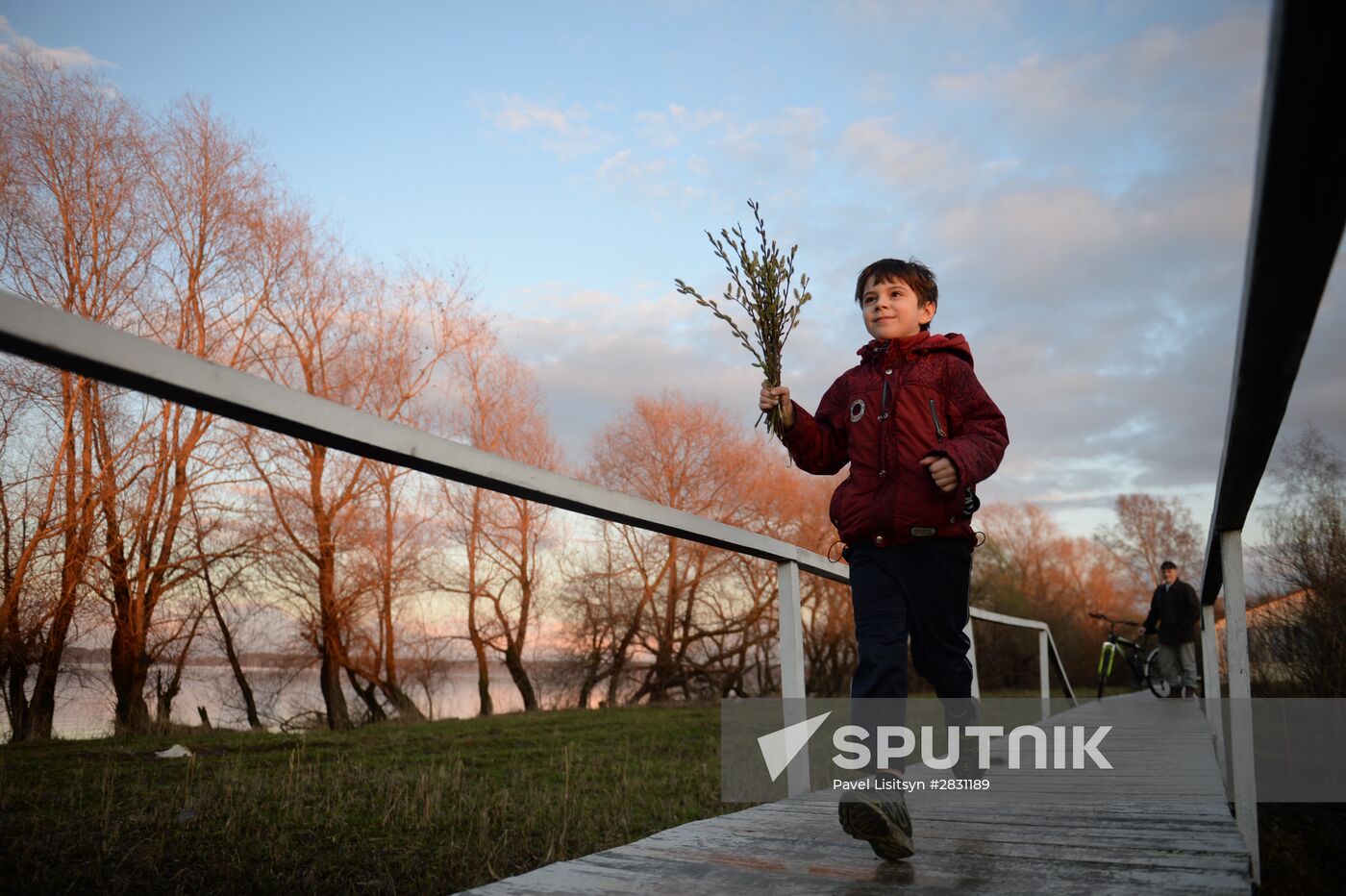 People collect willow branches for Palm Sunday on Lake Shartash in Yekaterinburg