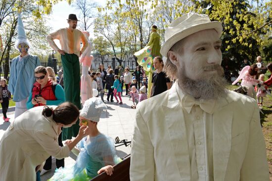 Stiltwalkers march at Between the Earth and Sky festival