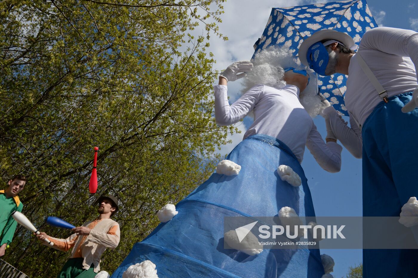 Stiltwalkers march at Between the Earth and Sky festival