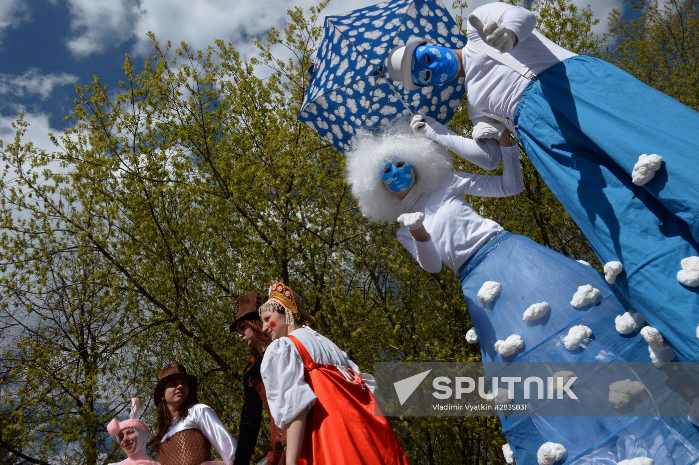 Stiltwalkers march at Between the Earth and Sky festival
