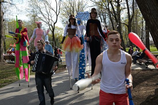 Stiltwalkers march at Between the Earth and Sky festival