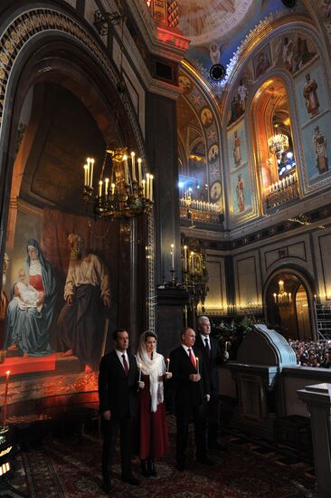 Russian President Vladimir Putin and Russian Prime Minister Dmitry Medvedev attend Easter service at Christ the Savior Cathedral in Moscow