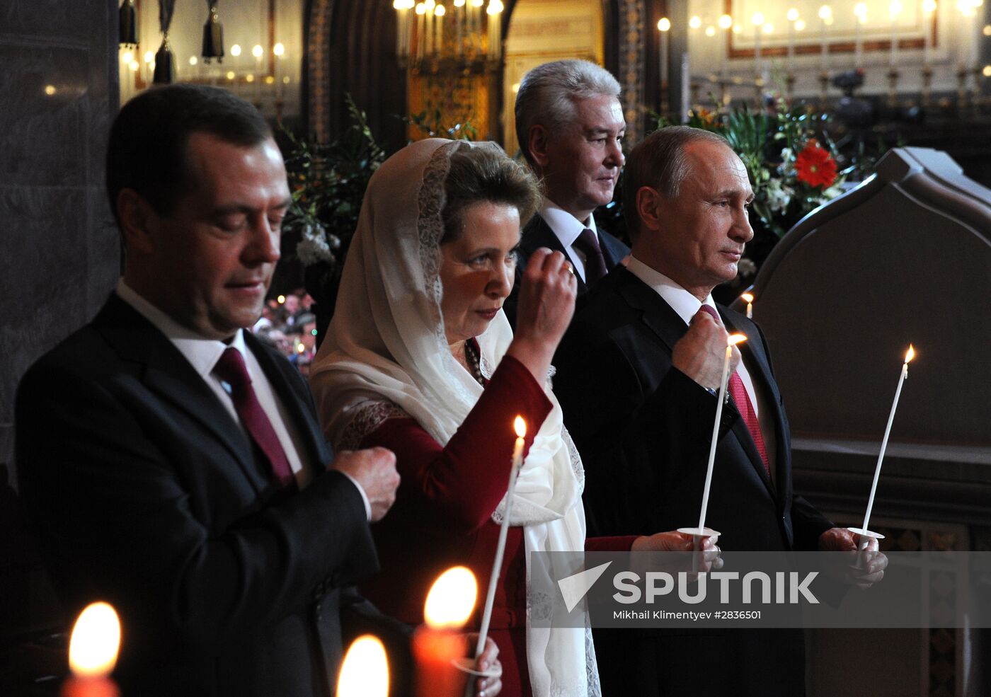 Russian President Vladimir Putin and Russian Prime Minister Dmitry Medvedev attend Easter service at Christ the Savior Cathedral in Moscow