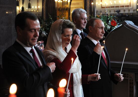 Russian President Vladimir Putin and Russian Prime Minister Dmitry Medvedev attend Easter service at Christ the Savior Cathedral in Moscow