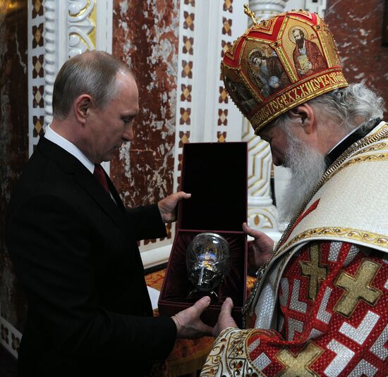 Russian President Vladimir Putin and Russian Prime Minister Dmitry Medvedev attend Easter service at Christ the Savior Cathedral in Moscow