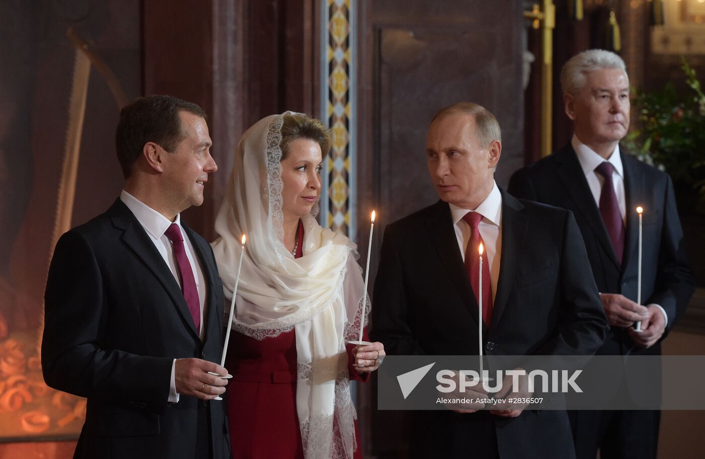 Russian President Vladimir Putin and Russian Prime Minister Dmitry Medvedev attend Easter service at Christ the Savior Cathedral in Moscow