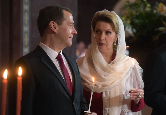 Russian President Vladimir Putin and Russian Prime Minister Dmitry Medvedev attend Easter service at Christ the Savior Cathedral in Moscow
