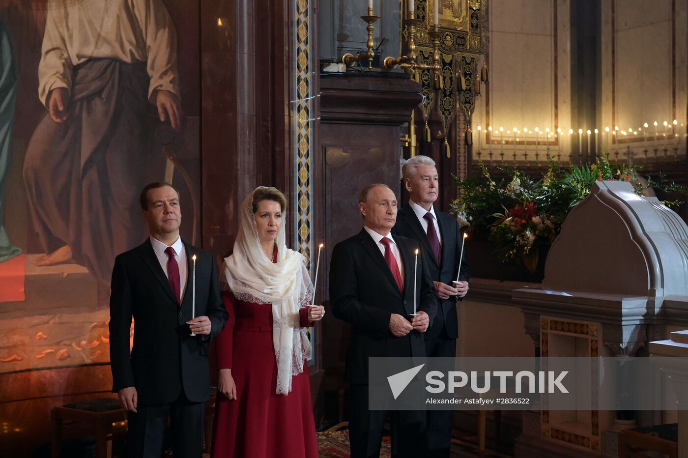 Russian President Vladimir Putin and Russian Prime Minister Dmitry Medvedev attend Easter service at Christ the Savior Cathedral in Moscow