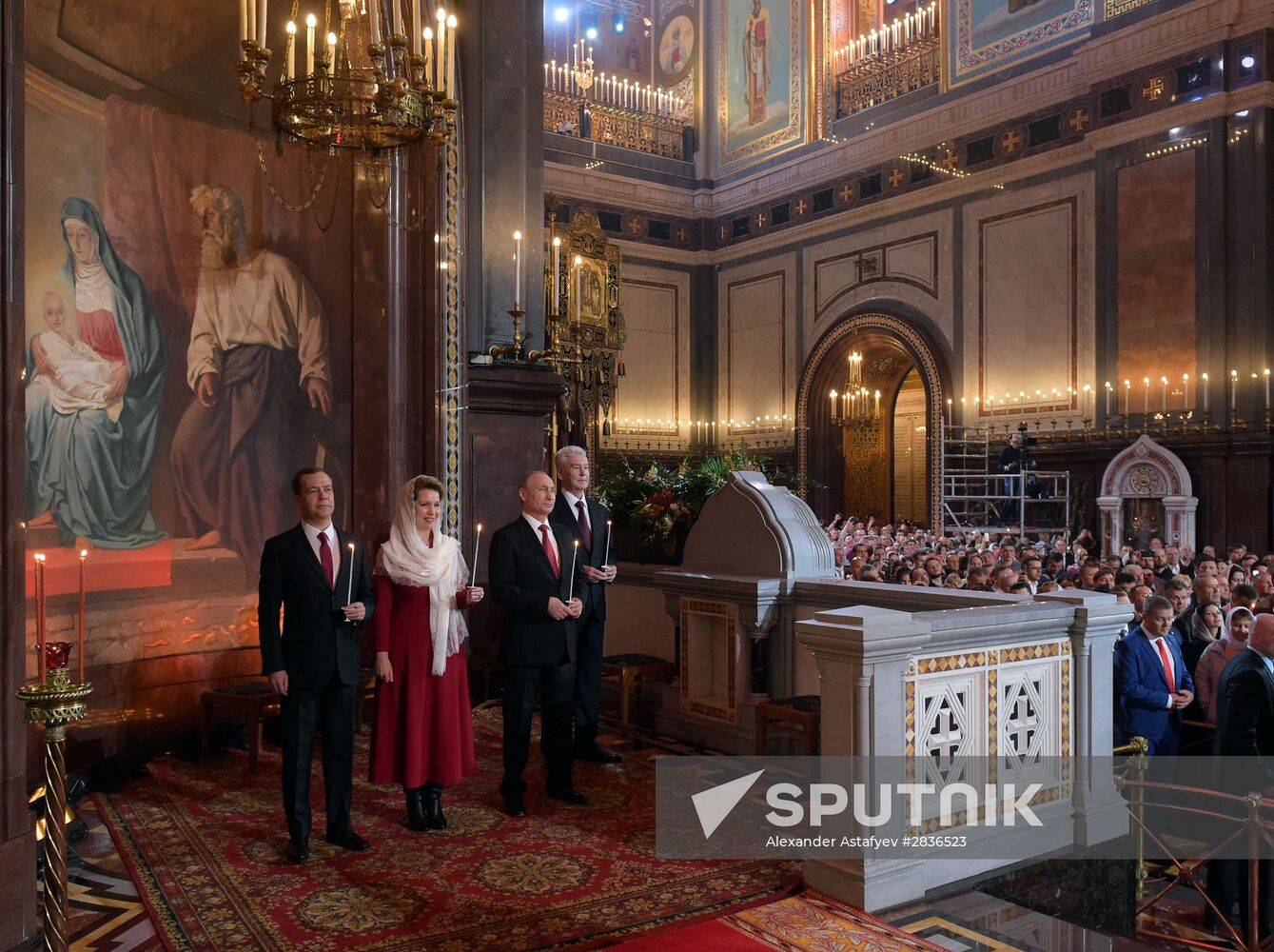 Russian President Vladimir Putin and Russian Prime Minister Dmitry Medvedev attend Easter service at Christ the Savior Cathedral in Moscow