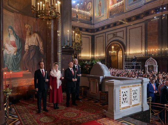 Russian President Vladimir Putin and Russian Prime Minister Dmitry Medvedev attend Easter service at Christ the Savior Cathedral in Moscow