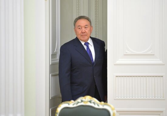 Russian President Vladimir Putin meets with Kazakh President Nursultan Nazarbayev
