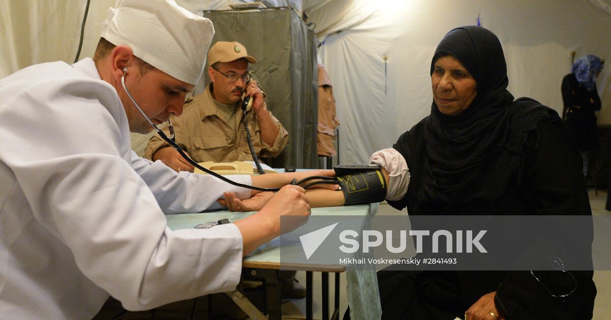 Военный врач в больнице. Военные медики РФ В Сирии. Военный госпиталь в Сирии. Российские военные медики в Сирии.