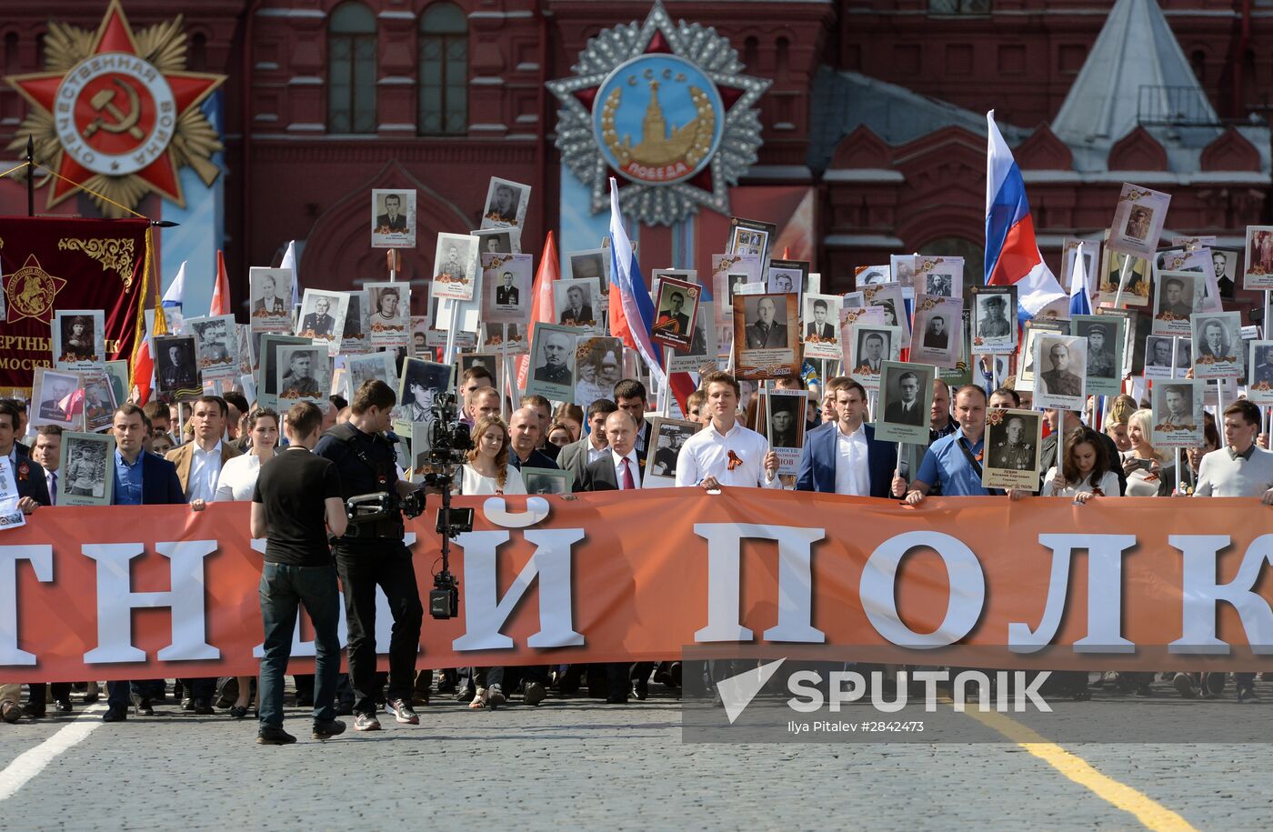 President Vladimir Putin takes part in Immortal Regiment march in Moscow