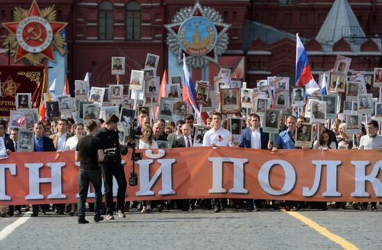 President Vladimir Putin takes part in Immortal Regiment march in Moscow