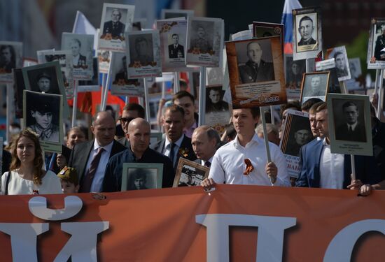 President Vladimir Putin takes part in Immortal Regiment march in Moscow