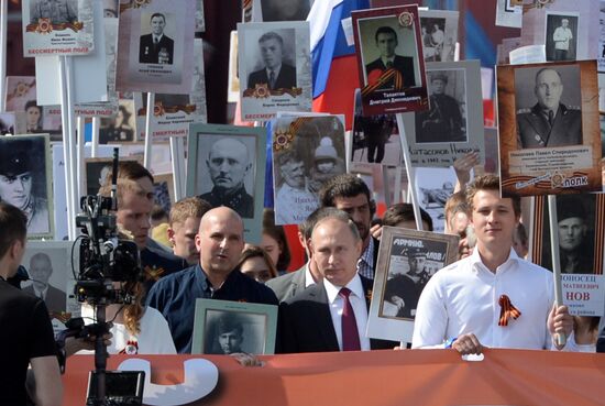 President Vladimir Putin takes part in Immortal Regiment march in Moscow