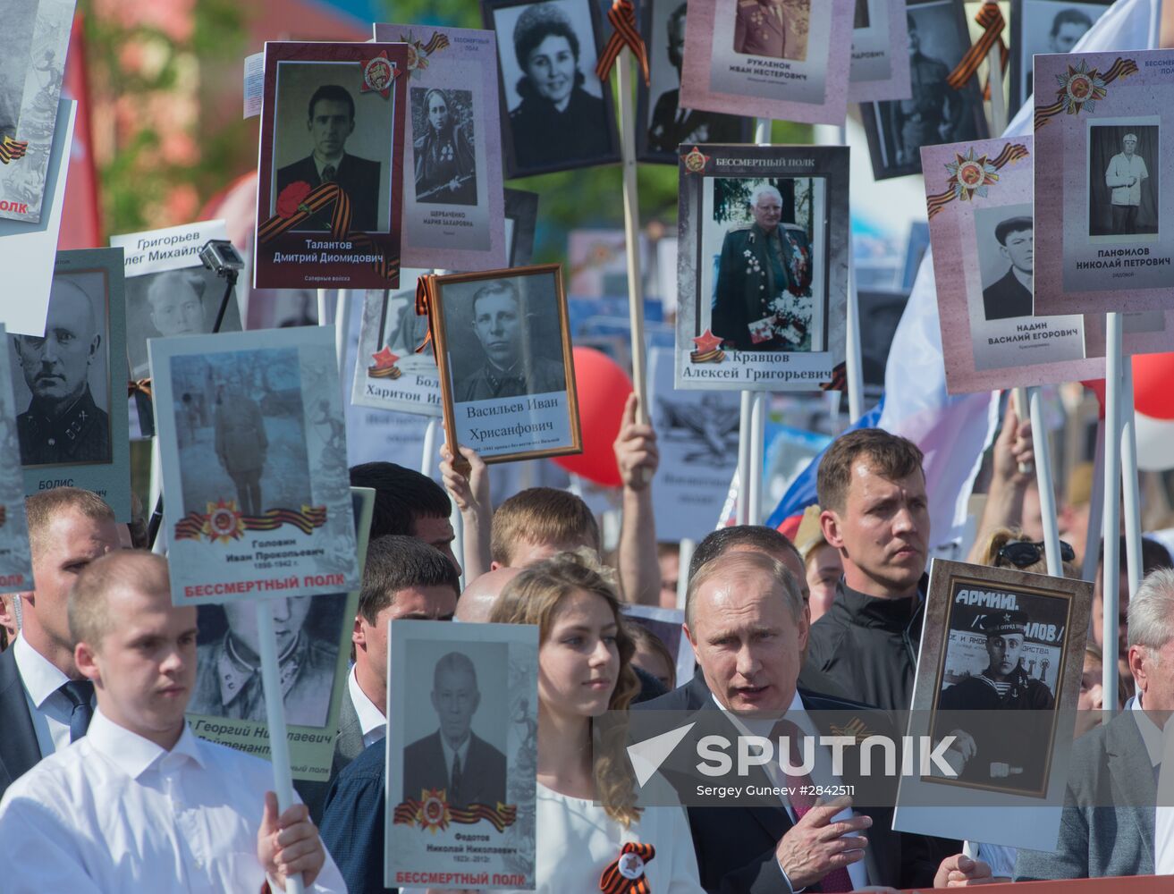President Vladimir Putin takes part in Immortal Regiment march in Moscow