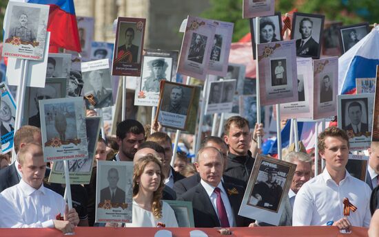 President Vladimir Putin takes part in Immortal Regiment march in Moscow