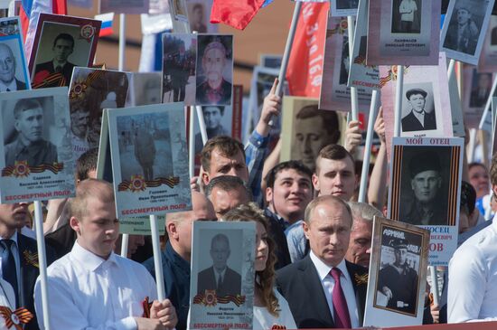 President Vladimir Putin takes part in Immortal Regiment march in Moscow