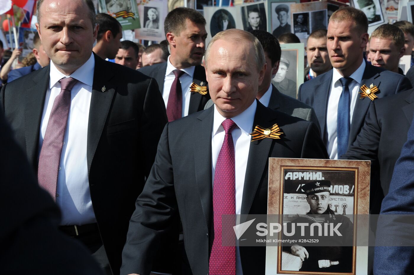 President Vladimir Putin takes part in Immortal Regiment march in Moscow