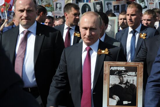 President Vladimir Putin takes part in Immortal Regiment march in Moscow