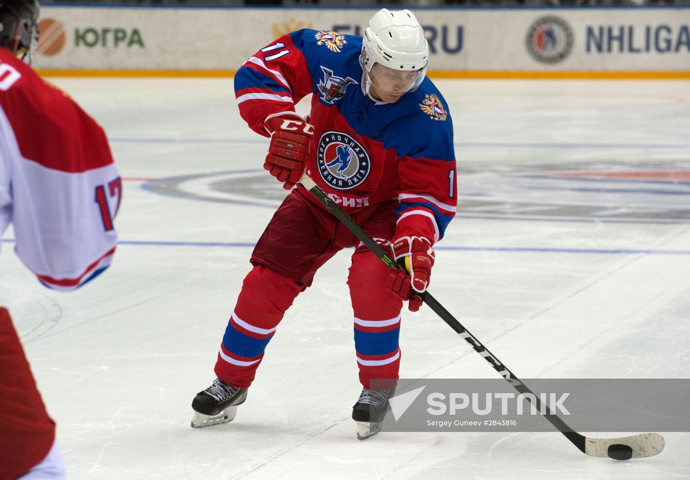 President Vladimir Putin participates in Night Hockey League gala match