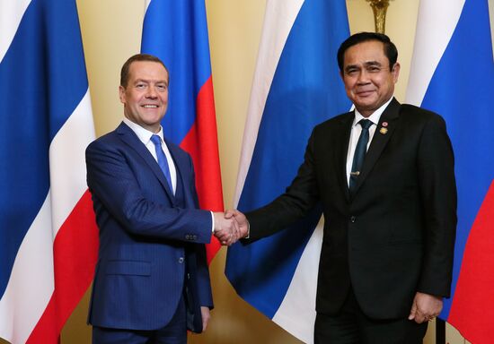 Russian Prime Minister Dmitry Medvedev meets with his Thai counterpart Prayut Chan-o-cha