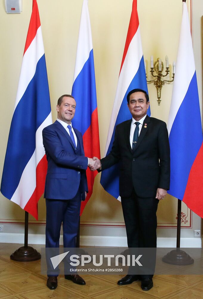 Russian Prime Minister Dmitry Medvedev meets with his Thai counterpart Prayut Chan-o-cha