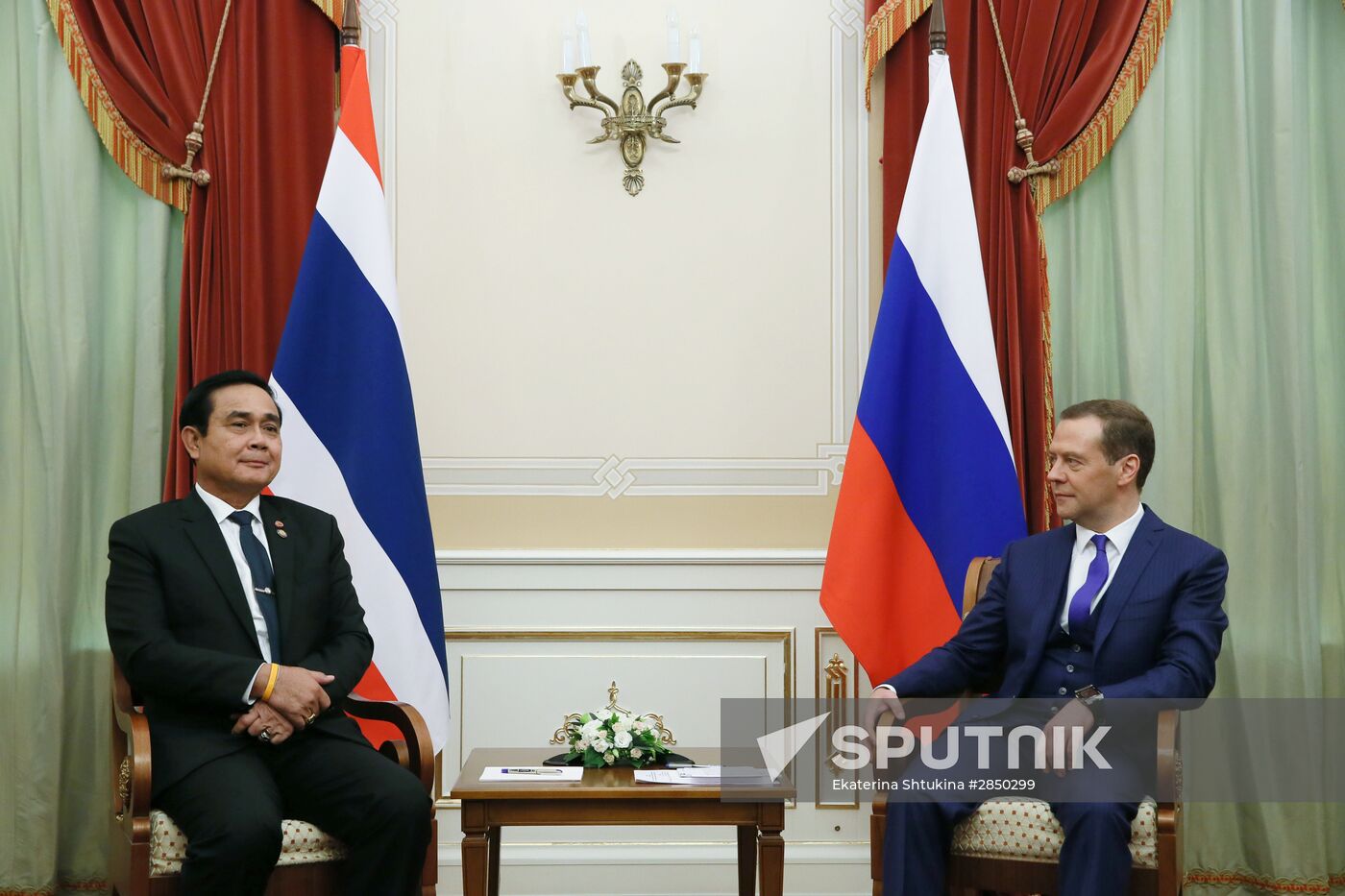 Russian Prime Minister Dmitry Medvedev meets with his Thai counterpart Prayut Chan-o-cha