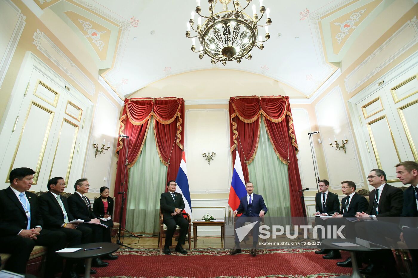 Russian Prime Minister Dmitry Medvedev meets with his Thai counterpart Prayut Chan-o-cha