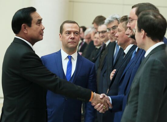 Russian Prime Minister Dmitry Medvedev meets with his Thai counterpart Prayut Chan-o-cha
