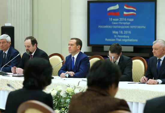 Russian Prime Minister Dmitry Medvedev meets with his Thai counterpart Prayut Chan-o-cha