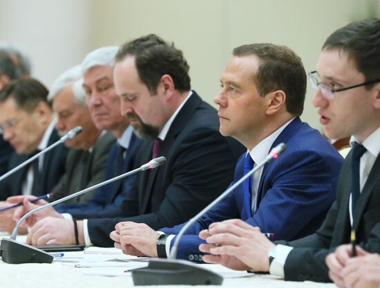 Russian Prime Minister Dmitry Medvedev meets with his Thai counterpart Prayut Chan-o-cha