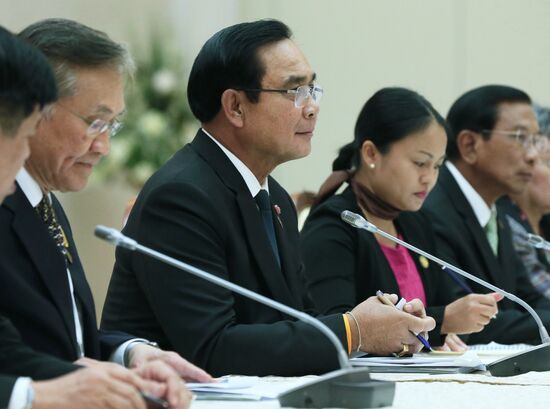 Russian Prime Minister Dmitry Medvedev meets with his Thai counterpart Prayut Chan-o-cha