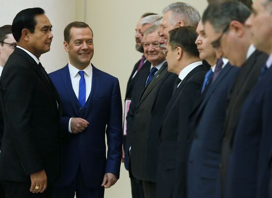 Russian Prime Minister Dmitry Medvedev meets with his Thai counterpart Prayut Chan-o-cha