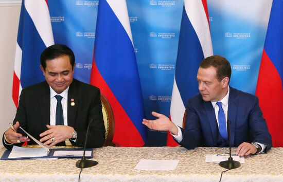 Russian Prime Minister Dmitry Medvedev meets with his Thai counterpart Prayut Chan-o-cha