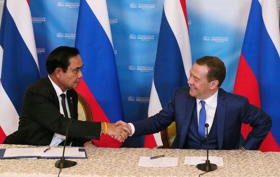 Russian Prime Minister Dmitry Medvedev meets with his Thai counterpart Prayut Chan-o-cha