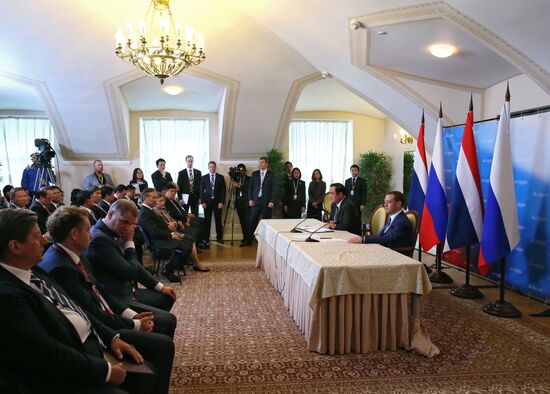 Russian Prime Minister Dmitry Medvedev meets with his Thai counterpart Prayut Chan-o-cha