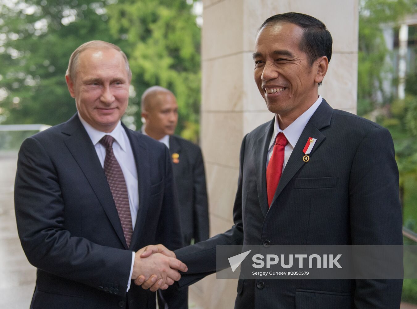 Vladimir Putin's limited attendance meeting with President of Indonesia Joko Widodo