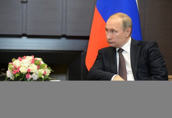 Vladimir Putin's limited attendance meeting with President of Indonesia Joko Widodo