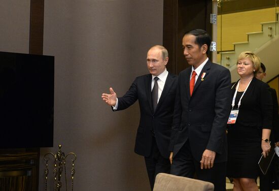 Vladimir Putin's limited attendance meeting with President of Indonesia Joko Widodo