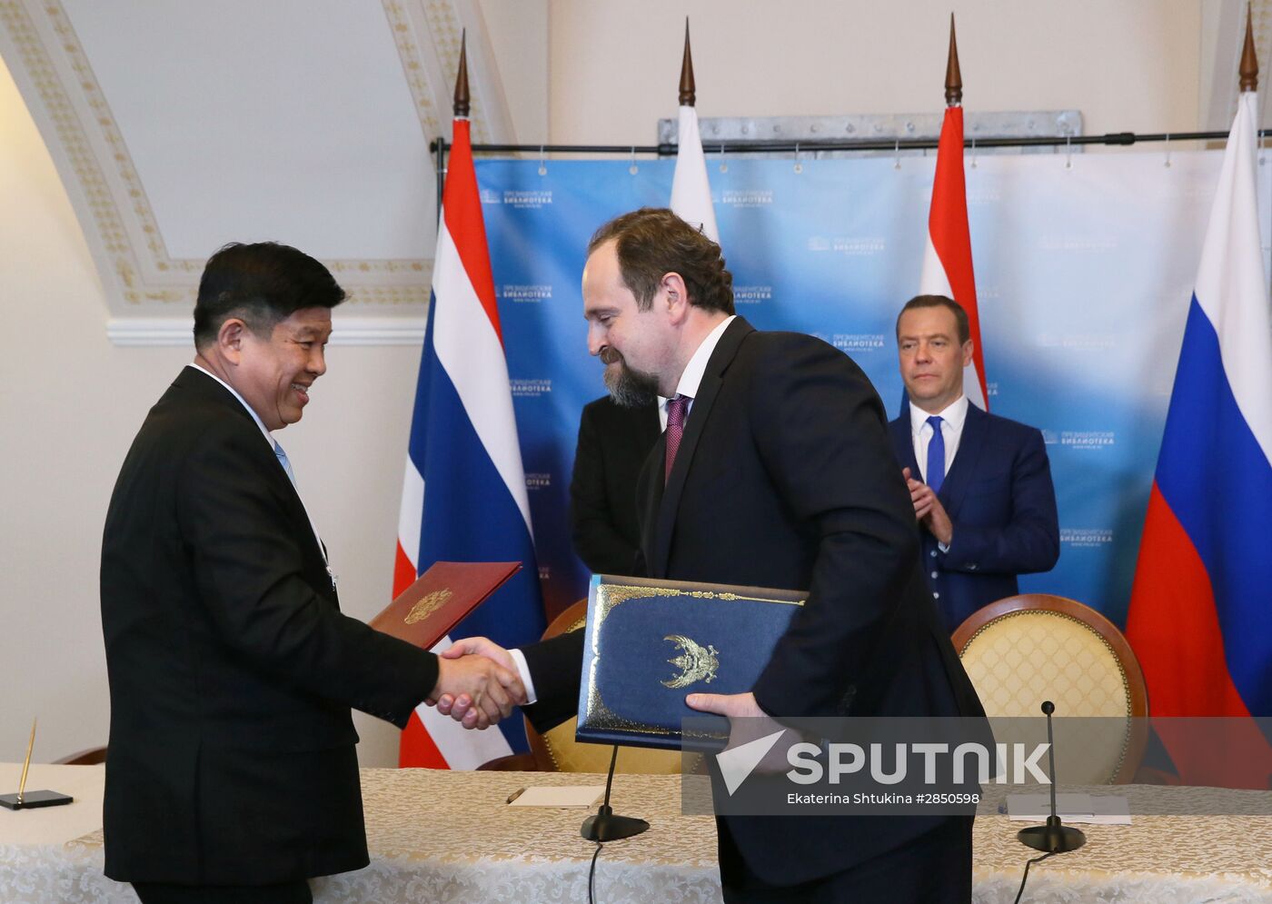 Russian Prime Minister Dmitry Medvedev meets with his Thai counterpart Prayut Chan-o-cha