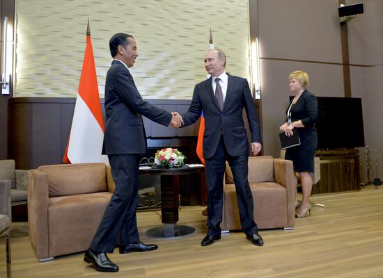 Vladimir Putin meets with President of Indonesia Joko Widodo
