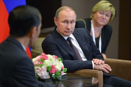 Vladimir Putin meets with President of Indonesia Joko Widodo