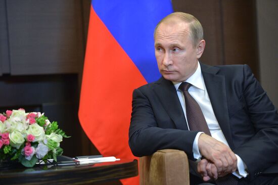 Vladimir Putin meets with President of Indonesia Joko Widodo